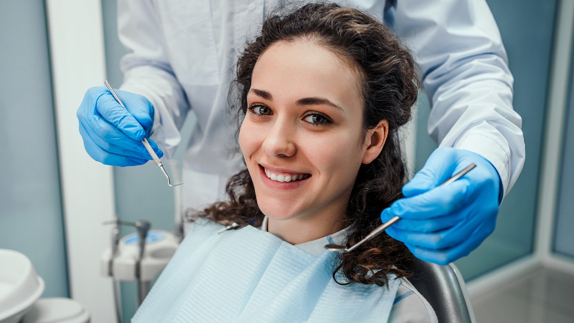 Smiling lady with curly hair